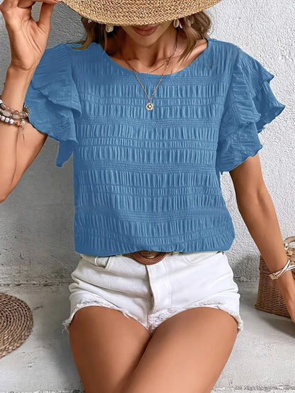 Charmaine | Airy blouse with playful ruffles