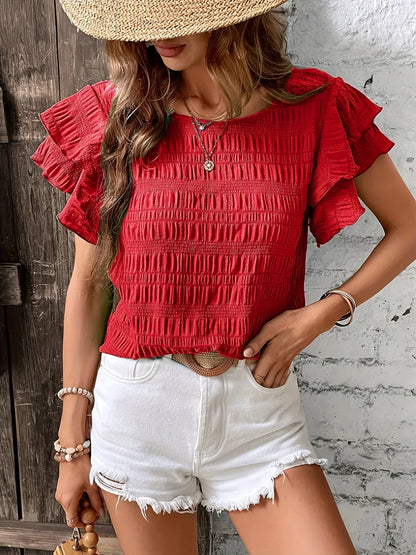 Charmaine | Airy blouse with playful ruffles