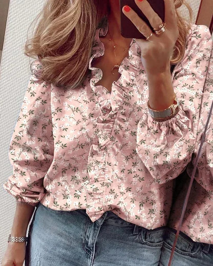 Enola | Charming blouse with playful ruffles