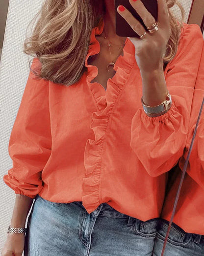 Enola | Charming blouse with playful ruffles