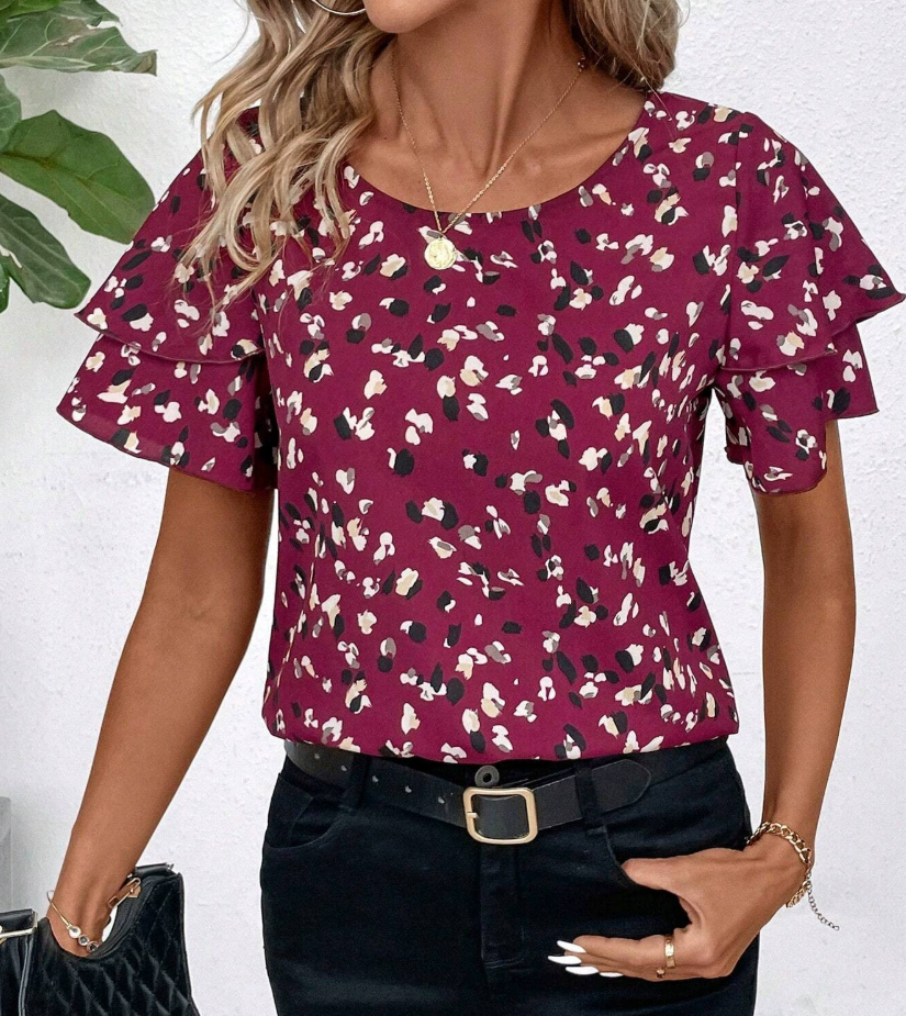 Regina | Trendy blouse with playful ruffles
